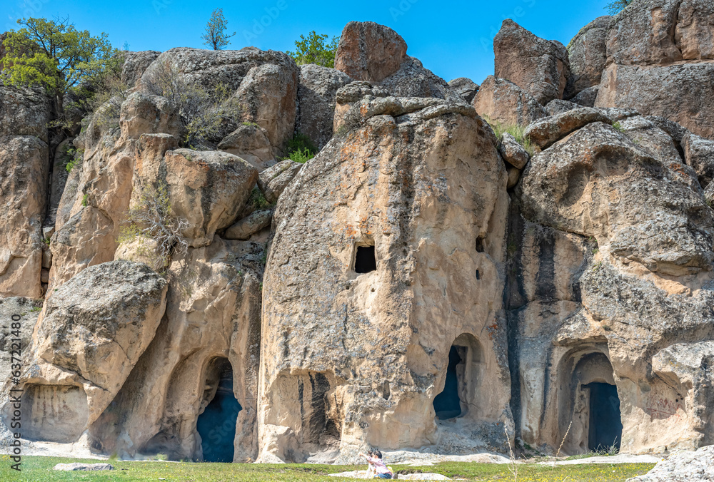 View of the old cave houses in the city of Guzelyurt in Turkey