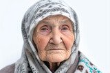 an old woman with a scarf on her head