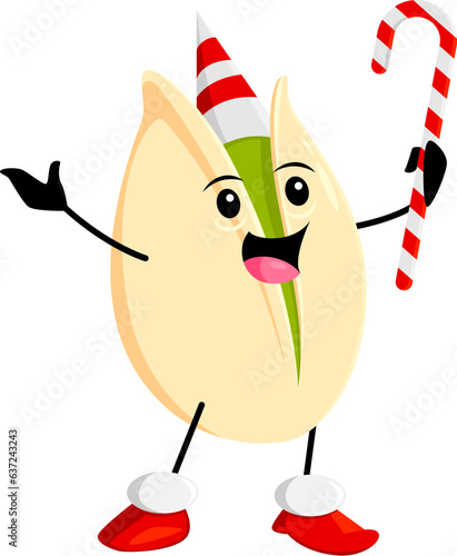 Cartoon Christmas pistachio nut character wearing striped festive hat. Isolated vector cheerful kernel snack personage joyfully celebrate holiday with a candy cane, adding festive cheer to celebration