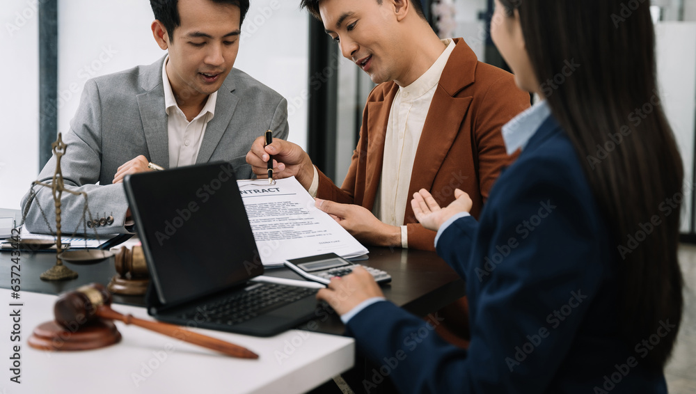 Team lawyer businessmen working with paperwork on his desk in office workplace for consultant lawyer in office. Team lawyer businessmen working with paperwork on his desk in office workplace for consultant lawyer in office.