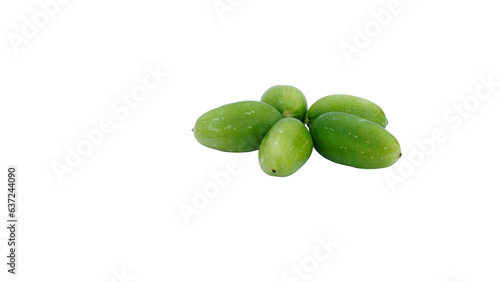 Green Pointed gourd or parwal in a bowl isolated on white background. photo