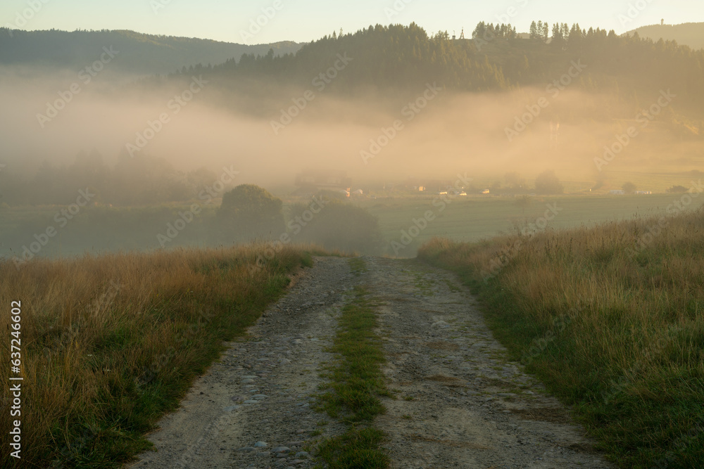 Mountainous gravel road with depth of field Mountainous gravel road with depth of field