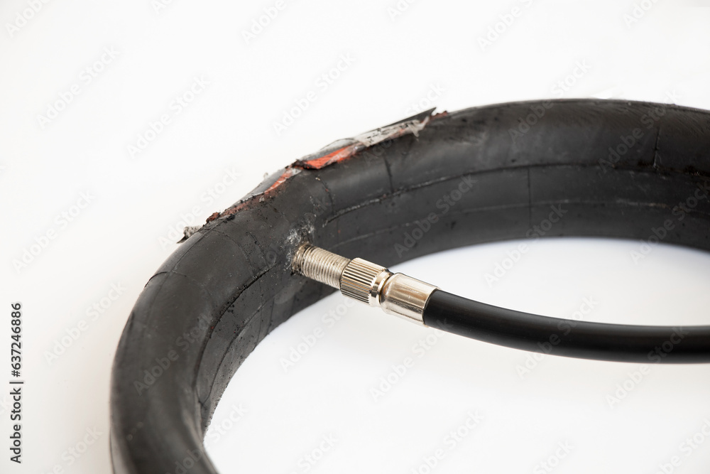 Glued camera of an electric scooter and a hand pump pumps the camera on