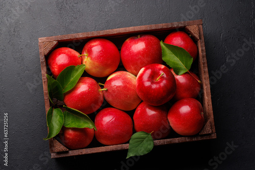 Wooden box with fresh red apples