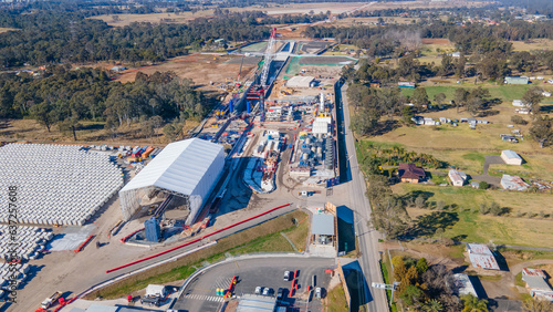 Canvas Print Aerial drone view of the construction site of the new metro station at Orchard H
