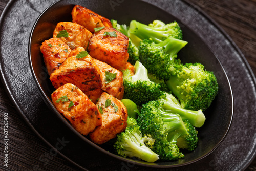 fried salmon bites with steamed broccoli florets