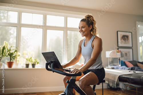 Woman engaging in an online fitness class with a stationary bike Free Download Woman engaging in an online fitness class with a stationary bike - GFXLoad