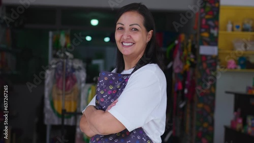 Brazilian Pet Store Proprietor Poses Confidently with Arms Crossed