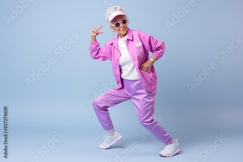 Elderly woman in sports clothing doing some fun dance moves
