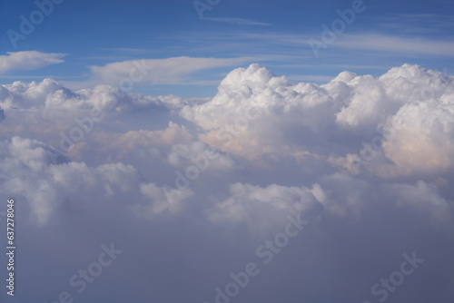 Fototapeta Naklejka Na Ścianę i Meble -  Clouds and blue sky as seen from an airplane