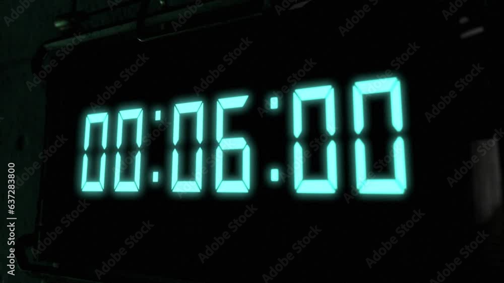 High quality CGI render of a digital countdown timer on a wall-mounted screen, with glowing pale blue numbers, counting down from 10 to zero, with dramatic right to left camera move High quality CGI render of a digital countdown timer on a wall-mounted screen, with glowing pale blue numbers, counting down from 10 to zero, with dramatic right to left camera move