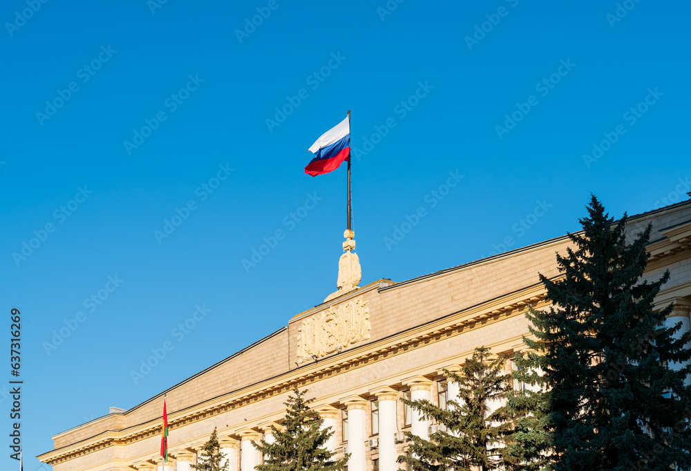 Lipetsk, Russia. Russian flag on the building of the Government of the Lipetsk region. Lenin-Cathedral Square