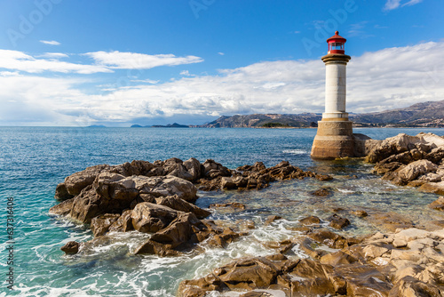 Lighthouse on the sea coast © Sergey Fedoskin