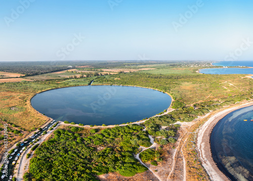 panoramica del bacino di torre colimena visto dal drone in estate, al tramonto - Salento, Puglia, Italy photo