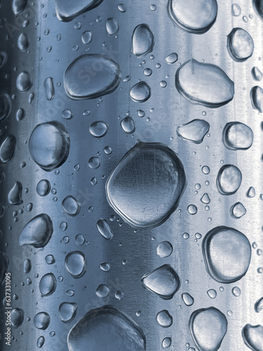 raindrops on metal surface in rainy days