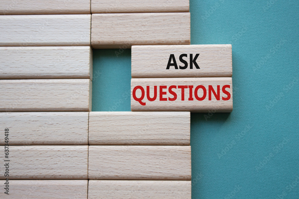 Ask Questions symbol. Wooden blocks with words Ask Questions. Beautiful grey green background. Business and Ask Questions concept. Copy space. Ask Questions symbol. Wooden blocks with words Ask Questions. Beautiful grey green background. Business and Ask Questions concept. Copy space.
