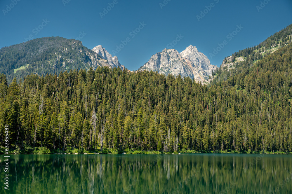 Blue Waters of Bradley Lake Below the Teton Mountains