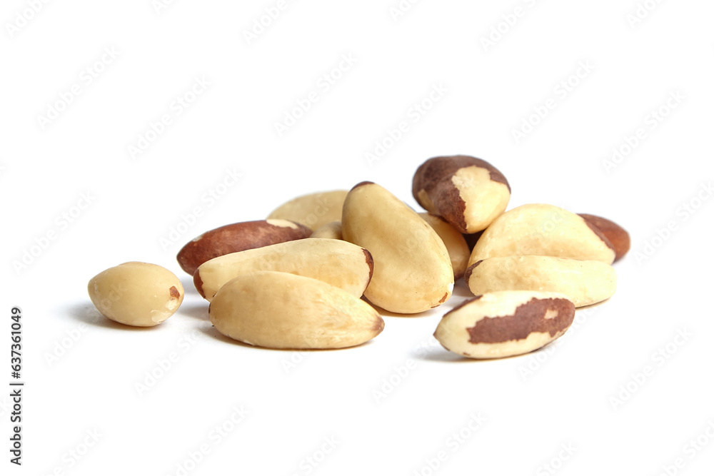 Fototapeta premium Brazil nuts isolated on white background. Organic Brazil nuts, a plant-based delight