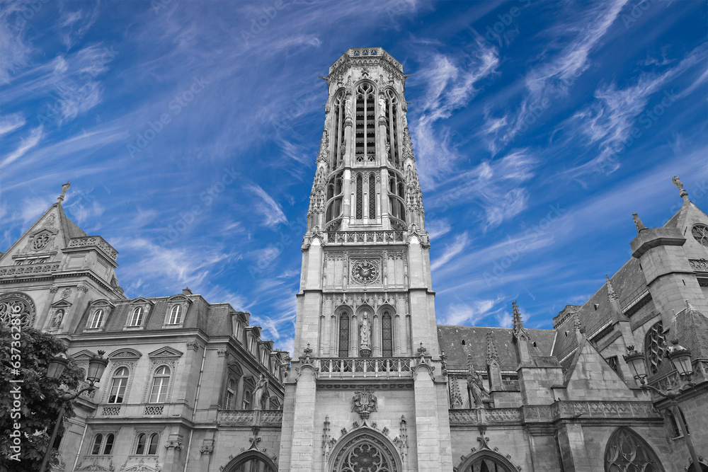 Great gothic church of Saint Germain l Auxerrois (against the background of sky with clouds), Paris, France