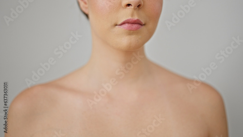 Young beautiful hispanic woman close up of serious expression over isolated white background