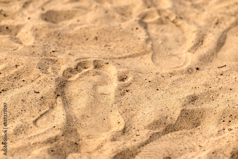 Human footprint in the sand. Footprint on the beach