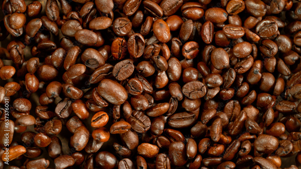 Freeze Motion Shot of Flying and Rotating Coffee Beans, Dark Background Freeze Motion Shot of Flying and Rotating Coffee Beans, Dark Background