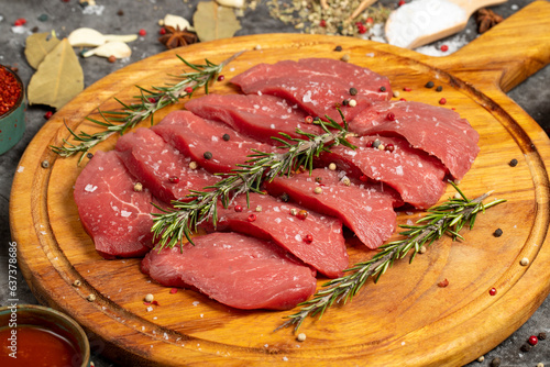 Beef Tenderloin. Fresh raw beef tenderloin on dark background. Butcher products