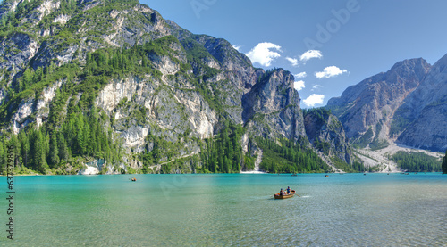 Lake Braies (or Lago di Braies) ship on the lake famous lake in Dolomites Alps Italy Europe extra wide panorama © jankost