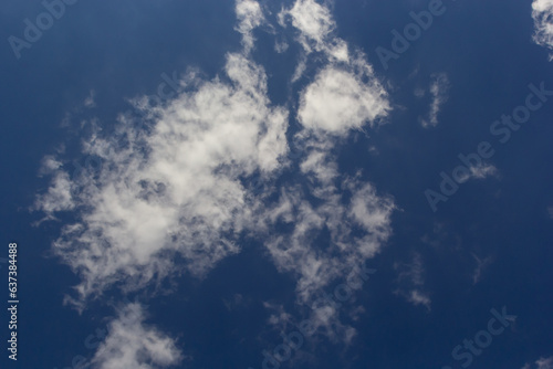 clouds in the sky lit by the sun on a summer day. background © Oleh Marchak