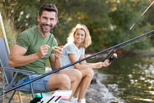 happy couple are fly fishing