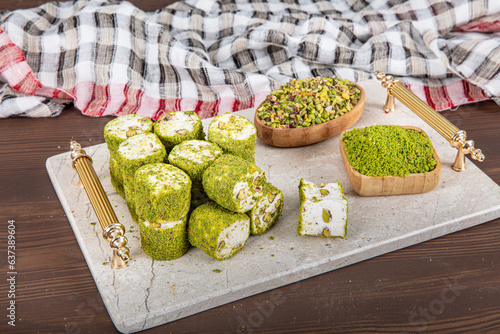 Delicious Turkish Delight with pistachios. Assortment of Turkish delight with pistachio. Mixed Turkish Delight. local name Antep fistikli lokum. photo