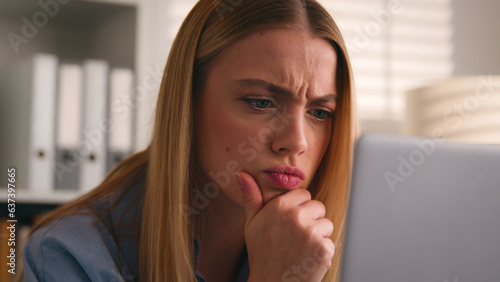 Εκτύπωση καμβά Serious girl frown puzzled stressed Caucasian woman looking at computer monitor