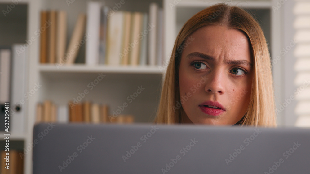 Close up anxiety worried Caucasian businesswoman with computer in office serious girl frown puzzled stressed woman thinking business solution problem thoughtful working online at laptop corporate app Close up anxiety worried Caucasian businesswoman with computer in office serious girl frown puzzled stressed woman thinking business solution problem thoughtful working online at laptop corporate app
