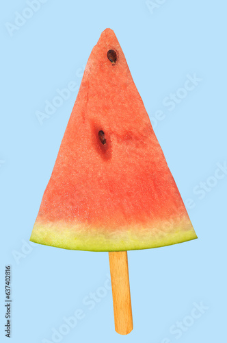 Slice of a watermelon on an ice cream stick-concept, on a blue background
