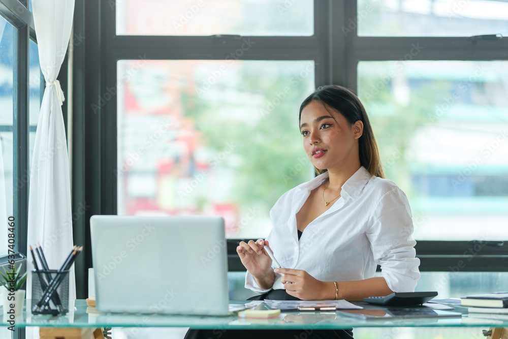 Thoughtful businesswoman looking out window, touching chin, visualizing future, business ideas. Thoughtful businesswoman looking out window, touching chin, visualizing future, business ideas.