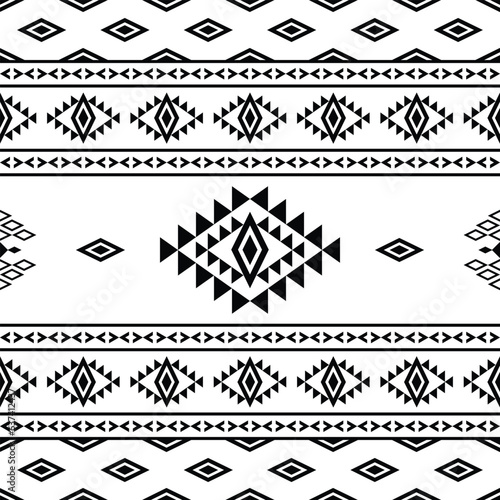 Ethnic geometric abstract background design for print fabric and fashion. Seamless pattern in folk art style. Aztec Navajo and Native American motifs.
