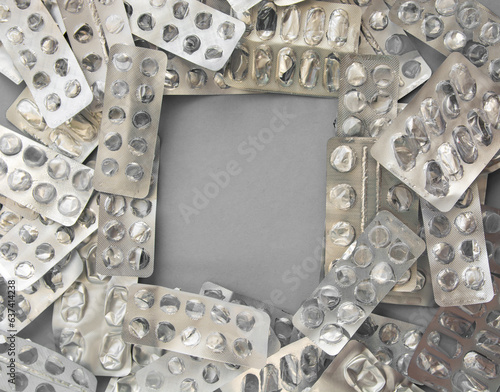 empty used pillboxes blank plates from pills, pharmaceutical background 