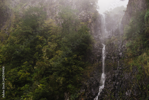 Travelling and exploring Madeira island landscapes and famous places. Summer tourism by Atlantic  ocean and mountains. Outdoor views on beautiful water  sky  cliffs  coastline and travel destination.