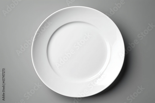 a white plate on a gray surface