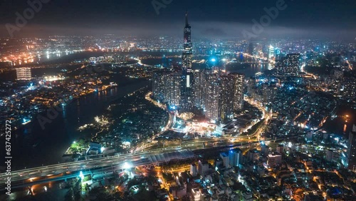 Aerial cityscape view of HoChiMinh city and the River Saigon, Vietnam with blue sky. Financial and business centers in developed Vietnam. photo