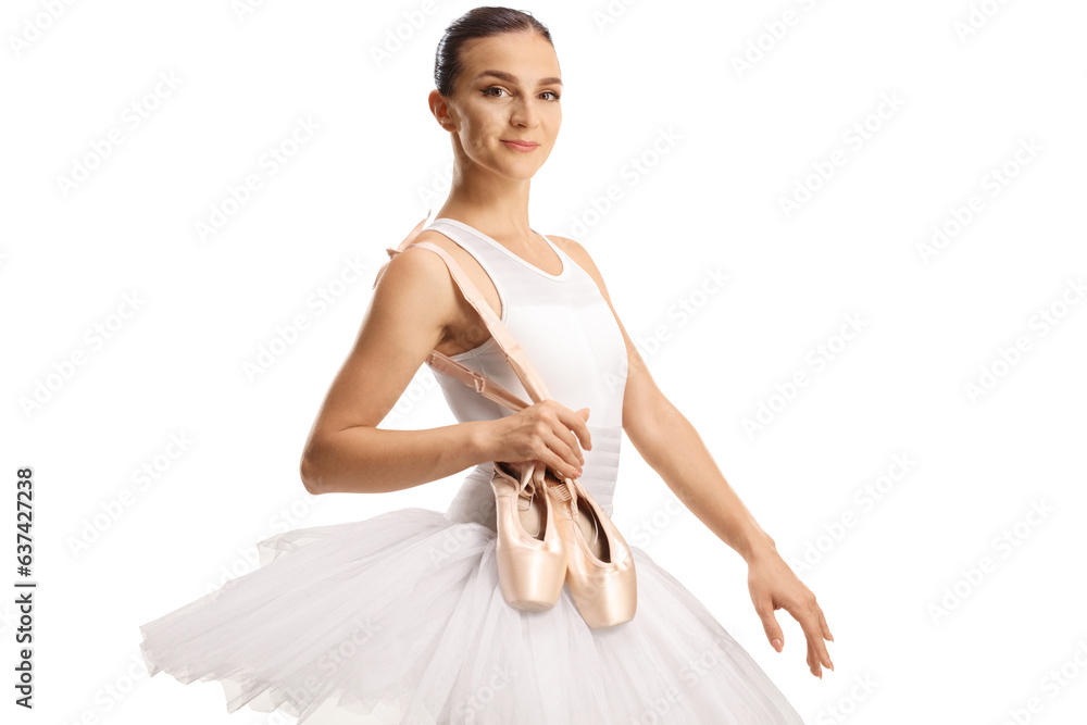 Ballet dancer holding her toe shoes and smiling Ballet dancer holding her toe shoes and smiling