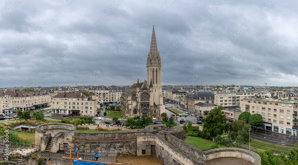 Caen, France - 07 27 2023: Castle of Caen. View of St. Peter's Church and the city from the castle and dungeons.