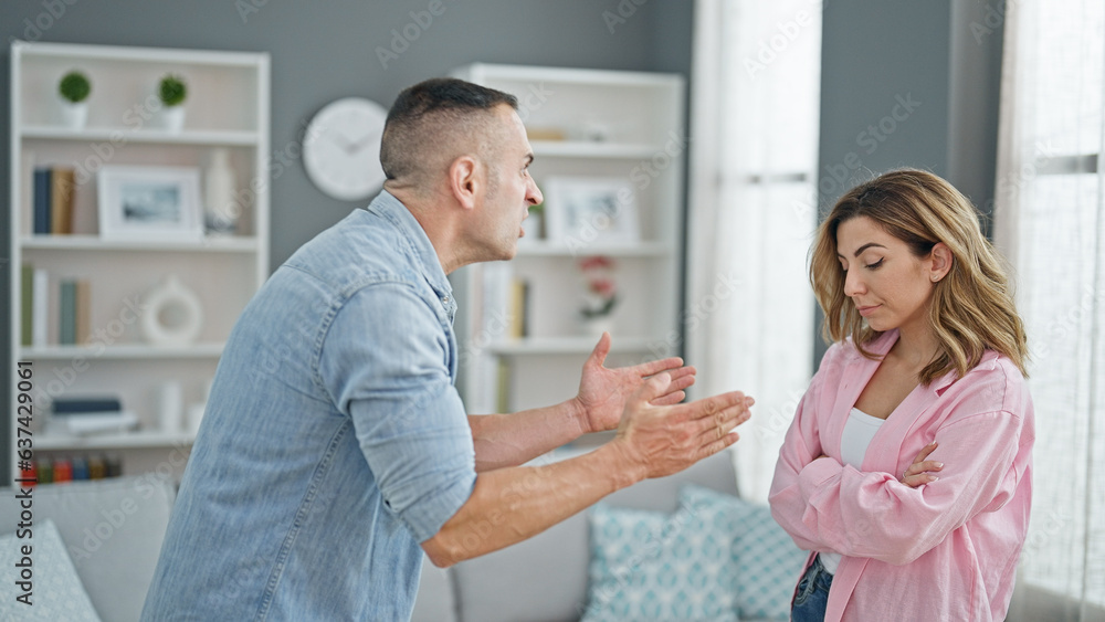 Man and woman couple arguing at home Man and woman couple arguing at home