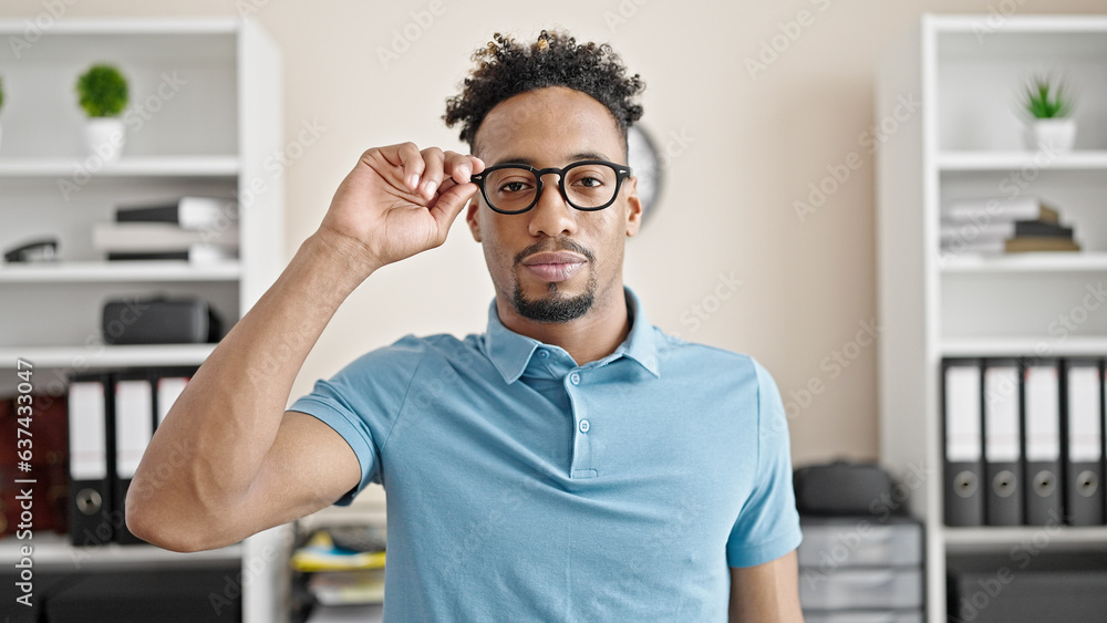 African american man business worker with serious face at office African american man business worker with serious face at office