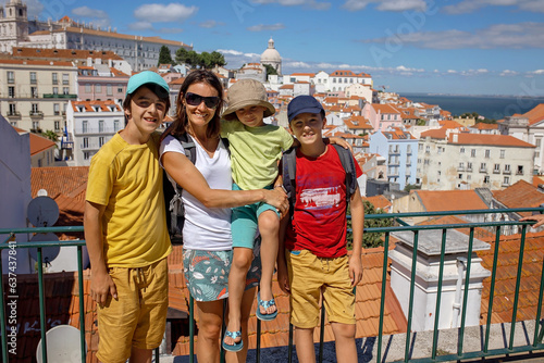 Happy people, visiting Lisbon during summer holiday, family with children