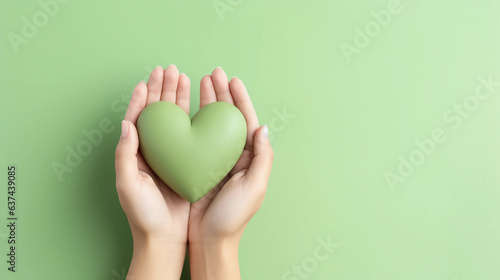 Woman hands holding green heart, Happiness moment, Health care, Save world, donate and family insurance concept, World heart day, Health day, Hope, Gratitude, Kindness, Valentine's Day. Generative AI.