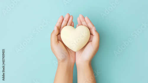 Woman hands holding yellow heart, Happiness moment, Health care, wellness, donate and family insurance concept, World heart day, Health day, Hope, Gratitude, Kindness, Valentine's Day. Generative AI.