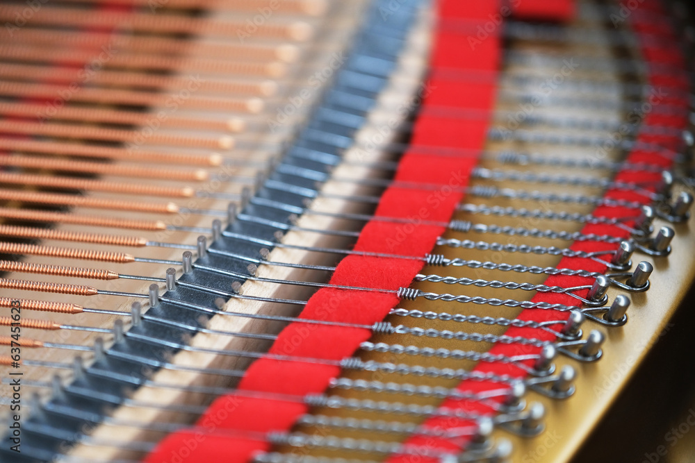 close up strings inside piano. String in classical instrument close up strings inside piano. String in classical instrument