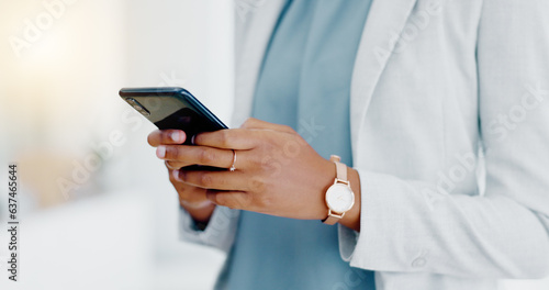 Black woman, hands and phone texting in business for communication, social media or chatting at the office. Hand of African American female typing on smartphone or mobile app for research or chat