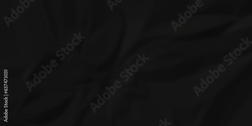 Dark crumple black paper wrinkled poster template ,blank glued creased paper texture background. black paper crumled backdrop background. used for cardboard and clarkboard.